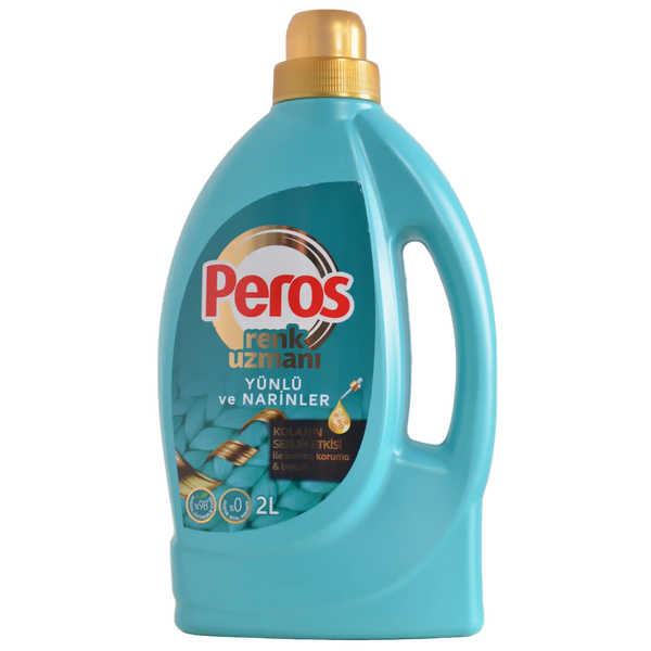 Blue bottle of Peros laundry detergent with gold cap on a white background